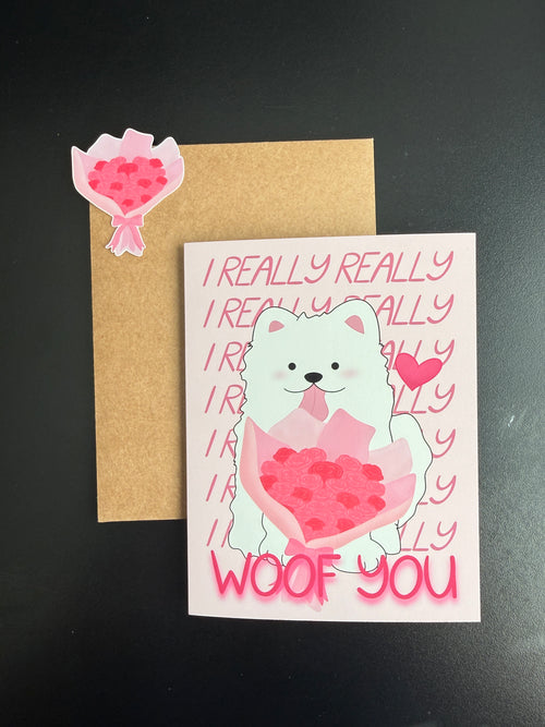 "I Really Really Woof You" Greeting Card unpackaged - card has a Samoyed on it with a bouquet of roses, as well as a matching sticker. 